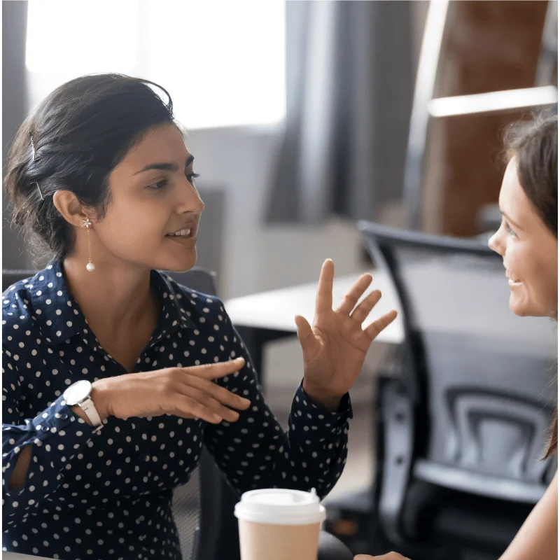 Two women talking