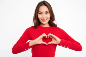 Women showing Heart hand